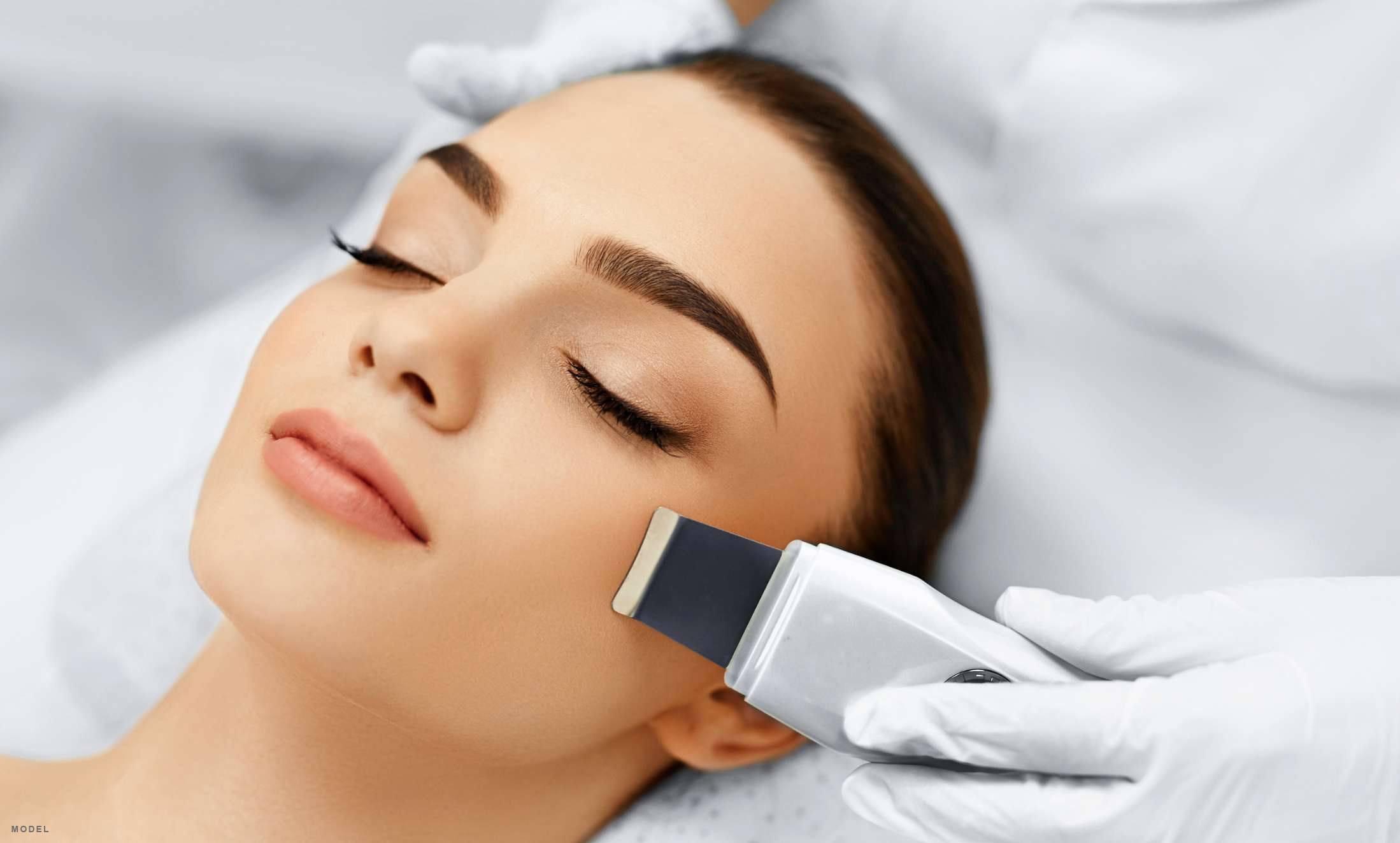 Woman at a spa receiving a treatment