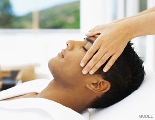 Man Getting a Head Massage in Spa